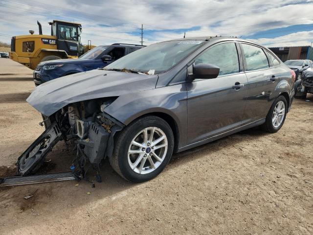 FORD FOCUS SE 2018 with VIN 1FADP3FE9JL325754 - Photo from auction