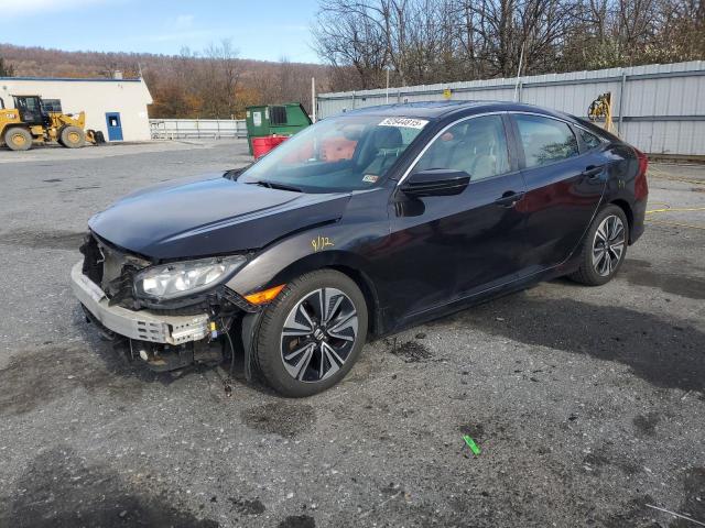 HONDA CIVIC EX 2017 with VIN 19XFC1F3XHE209600 - Photo from auction