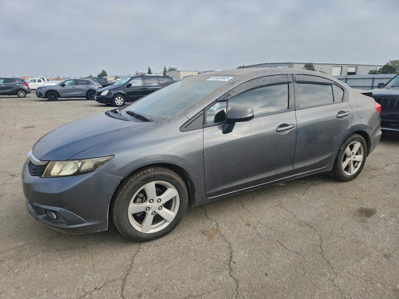 HONDA CIVIC LX 2012 with VIN 2HGFB2F55CH606639 - Photo from auction