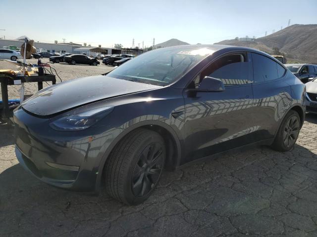 TESLA MODEL Y 2024 with VIN 7SAYGDED2RF207587 - Photo from auction