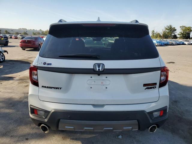 Photo 6 from auction – 2023 HONDA PASSPORT T with VIN 5FNYF8H63PB019792