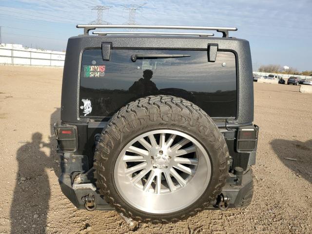 Photo 6 from auction – 2011 JEEP WRANGLER U with VIN 1J4BA6H16BL565225