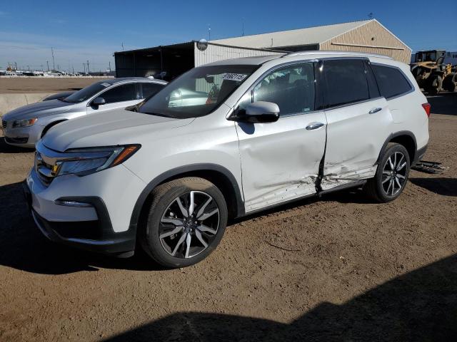 HONDA PILOT ELIT 2022 with VIN 5FNYF6H09NB007045 - Photo from auction