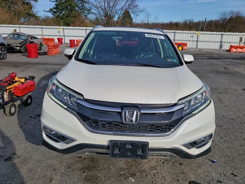 Photo 5 from auction – 2016 HONDA CR-V EXL with VIN 5J6RM4H77GL115234