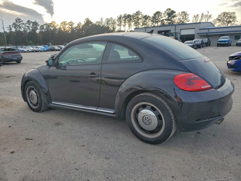 Photo 2 from auction – 2012 VOLKSWAGEN BEETLE with VIN 3VWJP7AT6CM636597