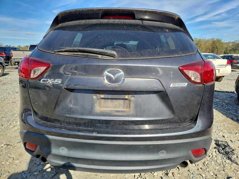 Photo 6 from auction – 2014 MAZDA CX-5 SPORT with VIN JM3KE2BE9E0334623