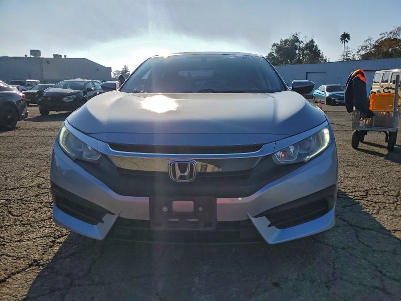 Photo 5 from auction – 2016 HONDA CIVIC LX with VIN 19XFC2F55GE238332