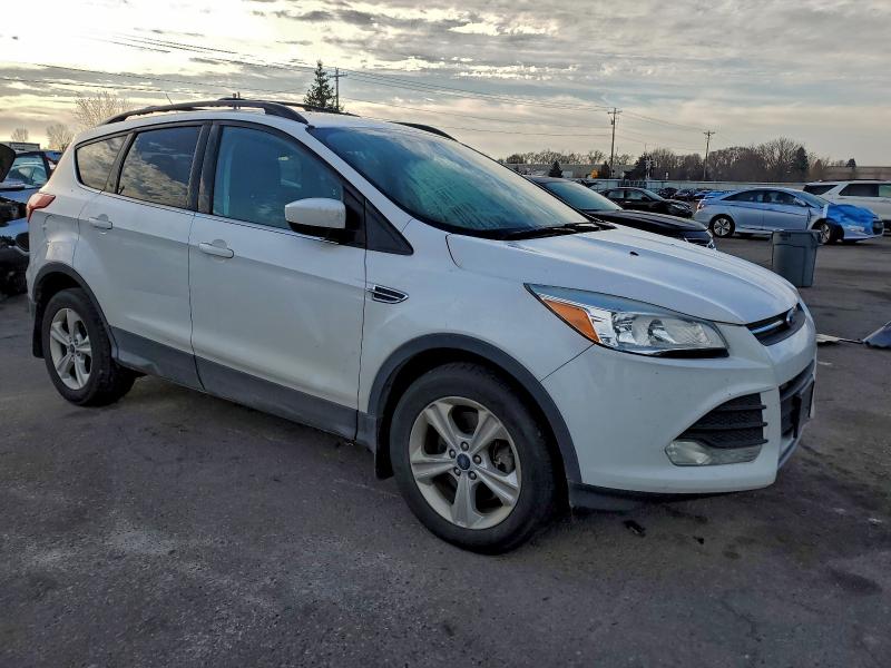 Photo 4 from auction – 2015 FORD ESCAPE SE with VIN 1FMCU9GX0FUA54632