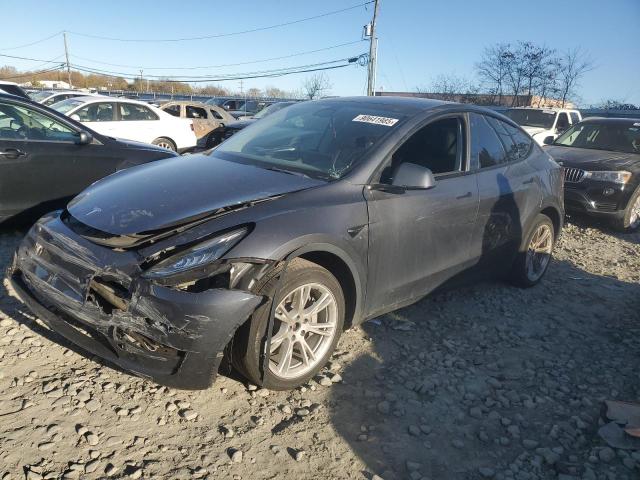 TESLA MODEL Y 2023 with VIN 7SAYGDEE0PA033540 - Photo from auction