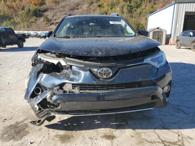 Photo 5 from auction – 2017 TOYOTA RAV4 XLE with VIN JTMRFREV1HJ709587