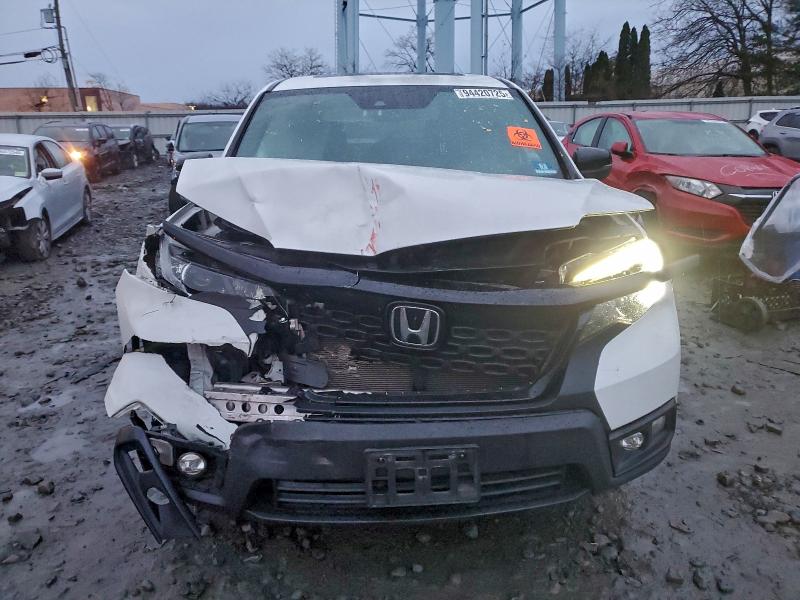 Photo 5 from auction – 2020 HONDA PASSPORT E with VIN 5FNYF8H56LB014054
