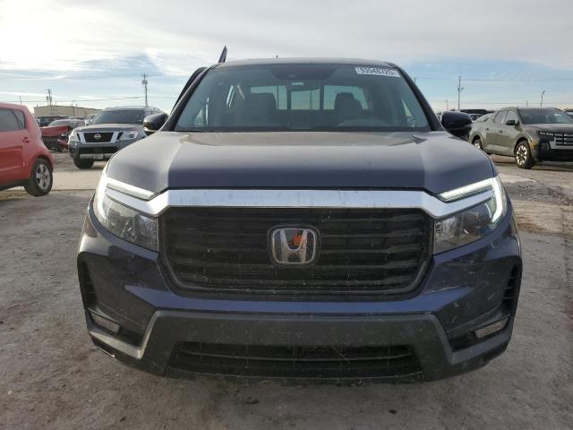 Photo 5 from auction – 2023 HONDA RIDGELINE with VIN 5FPYK3F77PB016122