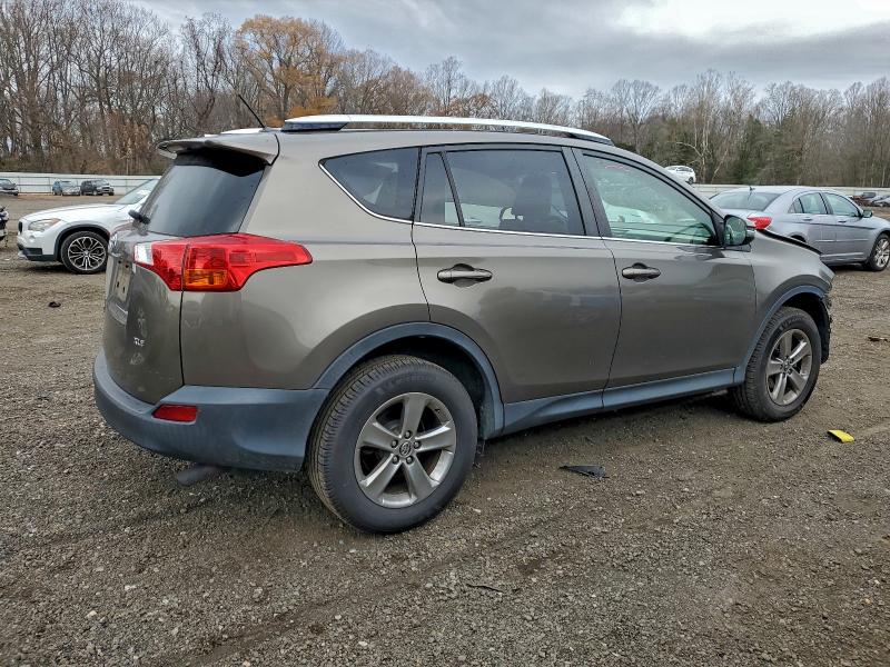Photo 3 from auction – 2015 TOYOTA RAV4 XLE with VIN JTMWFREV1FD047749