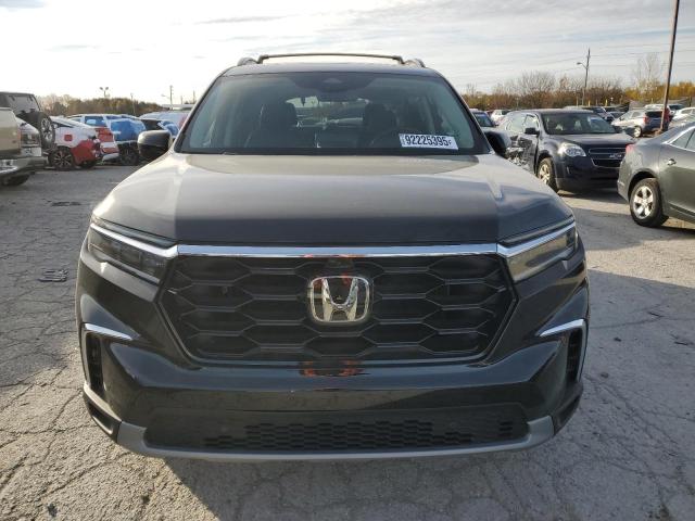 Photo 5 from auction – 2023 HONDA PILOT ELIT with VIN 5FNYG1H89PB028809