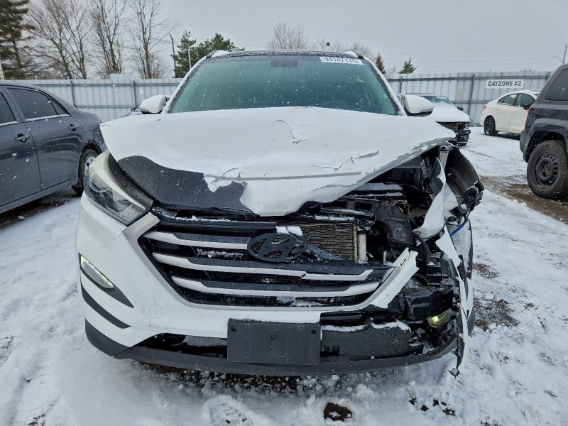 Photo 5 from auction – 2017 HYUNDAI TUCSON LIM with VIN KM8J3CA43HU418499