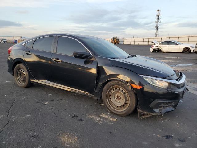 Photo 4 from auction – 2016 HONDA CIVIC LX with VIN 2HGFC2F52GH537623