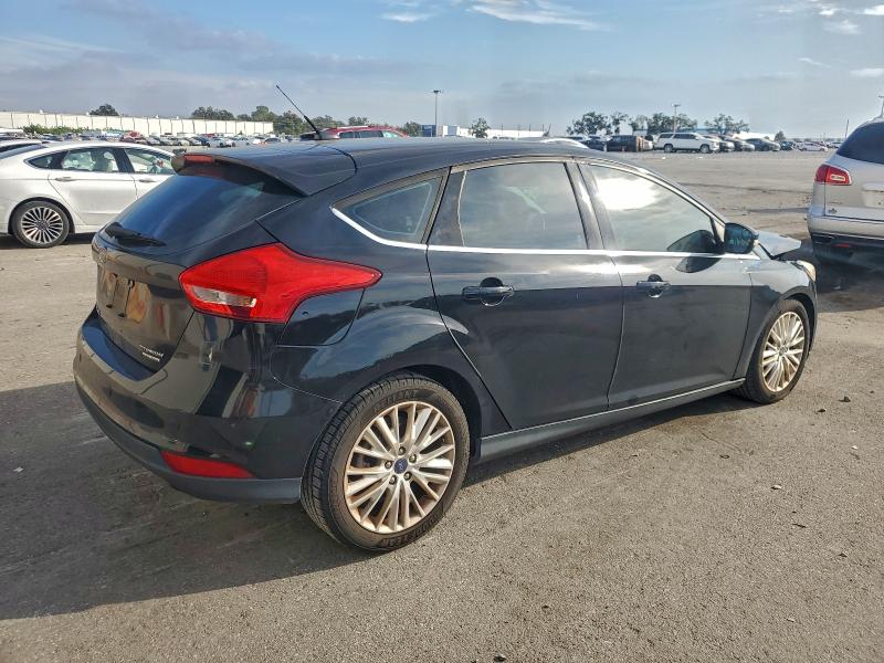 Photo 3 from auction – 2016 FORD FOCUS TITA with VIN 1FADP3N27GL339779