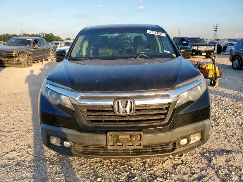 Photo 5 from auction – 2017 HONDA RIDGELINE with VIN 5FPYK2F66HB006247