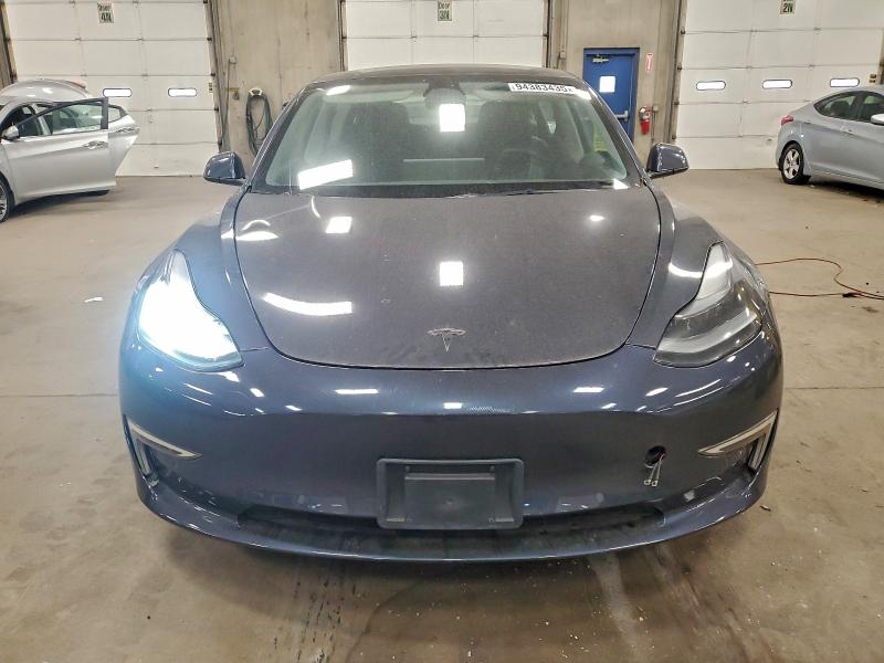 Photo 5 from auction – 2022 TESLA MODEL 3 with VIN 5YJ3E1EB7NF185946