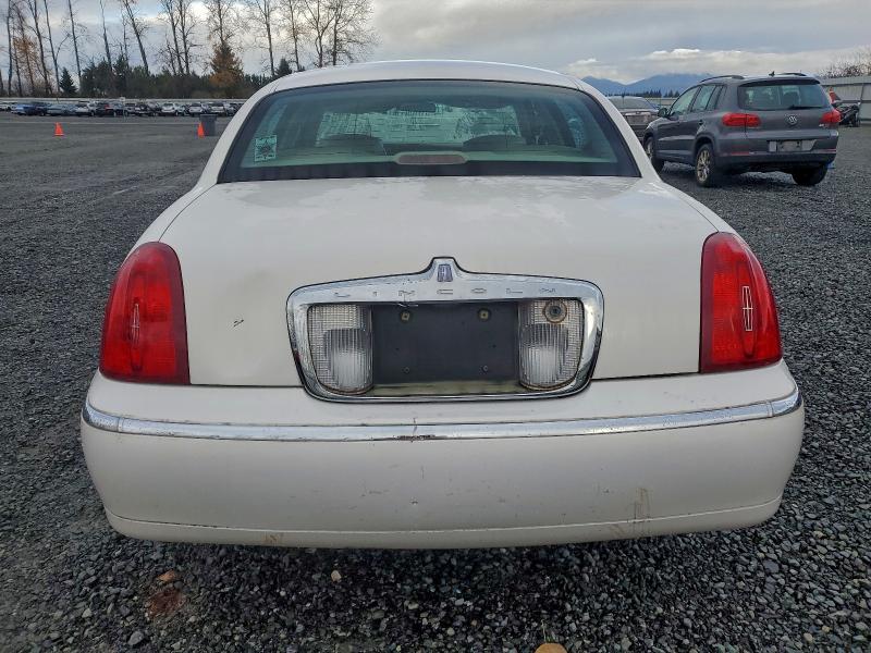 Photo 6 from auction – 2000 LINCOLN TOWN CAR E with VIN 1LNHM81W5YY765769
