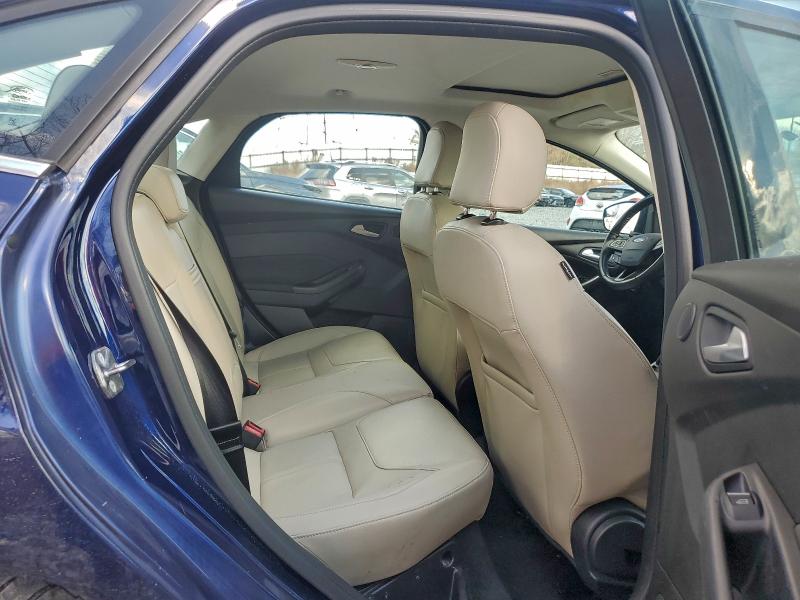 Photo 10 from auction – 2016 FORD FOCUS TITA with VIN 1FADP3J27GL229319