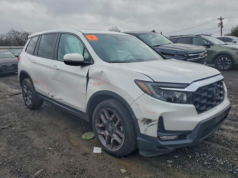 Photo 4 from auction – 2023 HONDA PASSPORT E with VIN 5FNYF8H53PB038253