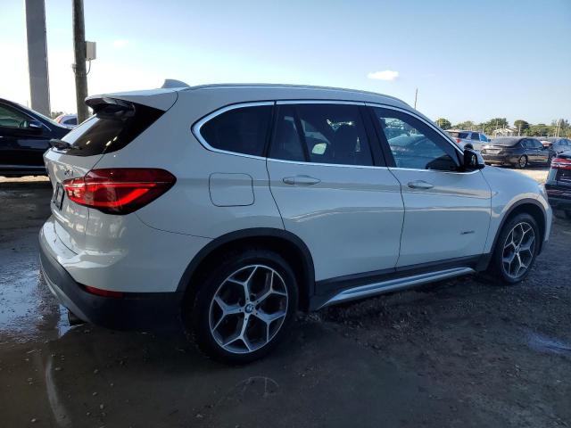 Photo 3 from auction – 2018 BMW X1 XDRIVE2 with VIN WBXHT3C32J5K22760