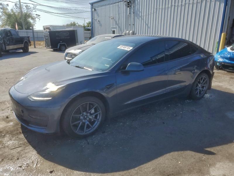 TESLA MODEL 3 2023 with VIN 5YJ3E1EA0PF652666 - Photo from auction