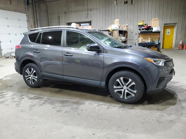Photo 4 from auction – 2017 TOYOTA RAV4 LE with VIN JTMBFREV1HJ711454