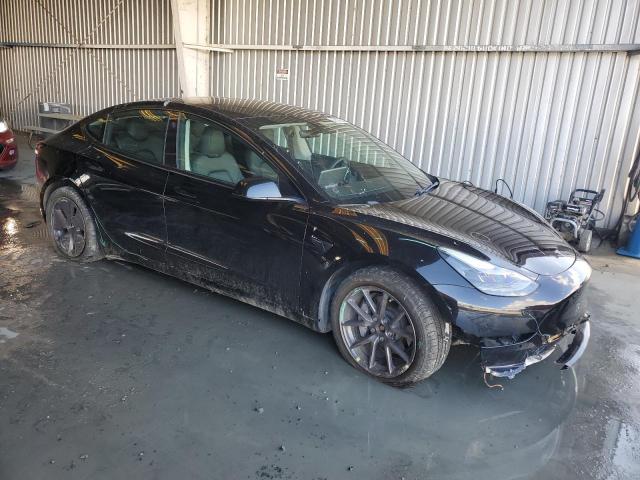Photo 4 from auction – 2021 TESLA MODEL 3 with VIN 5YJ3E1EB0MF877206