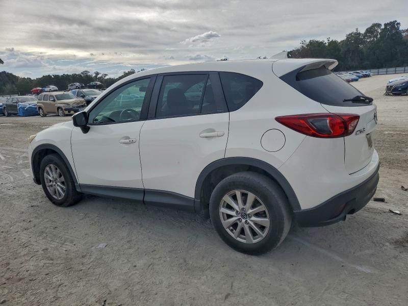 Photo 2 from auction – 2016 MAZDA CX-5 TOURI with VIN JM3KE2CYXG0619553