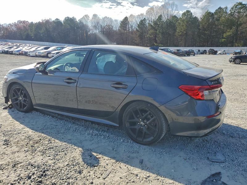 Photo 2 from auction – 2022 HONDA CIVIC SPOR with VIN 2HGFE2F51NH592863