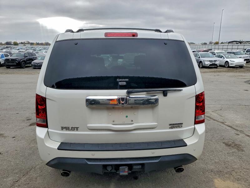 Photo 6 from auction – 2014 HONDA PILOT TOUR with VIN 5FNYF4H90EB041216