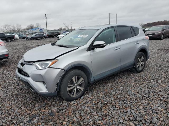 TOYOTA RAV4 2018 with VIN 2T3RFREV7JW814853 - Photo from auction