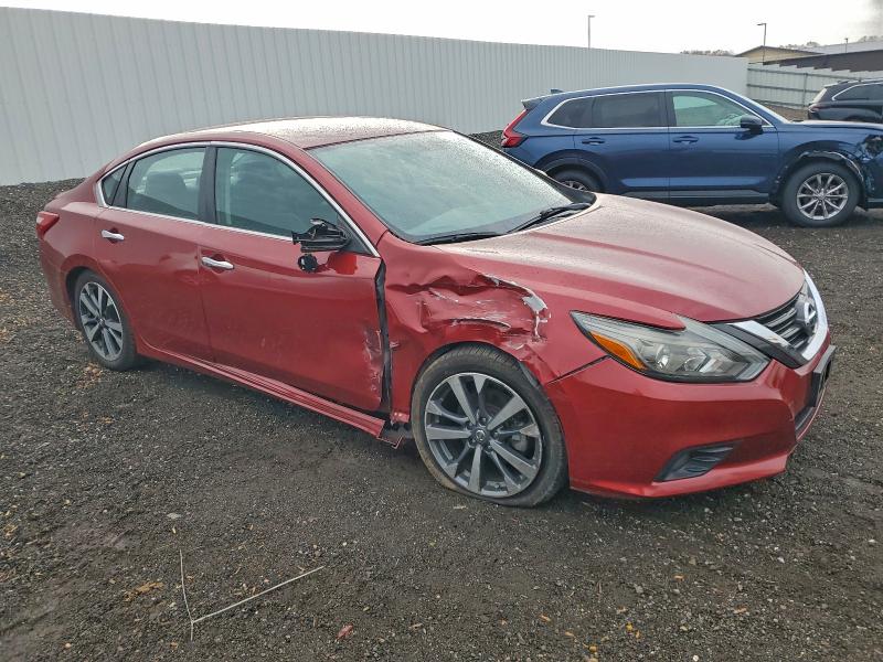Photo 4 from auction – 2016 NISSAN ALTIMA 2.5 with VIN 1N4AL3AP1GC284987