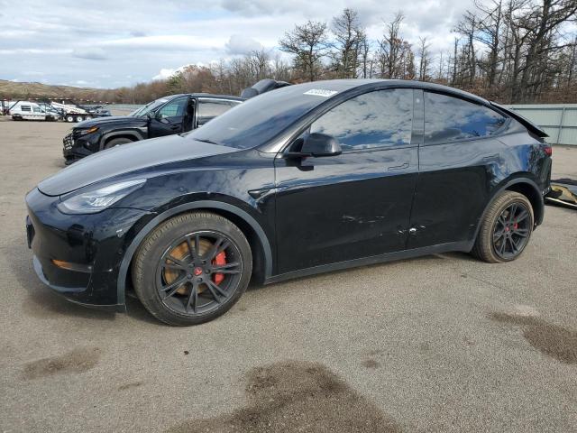 TESLA MODEL Y 2021 with VIN 5YJYGDEE2MF141766 - Photo from auction