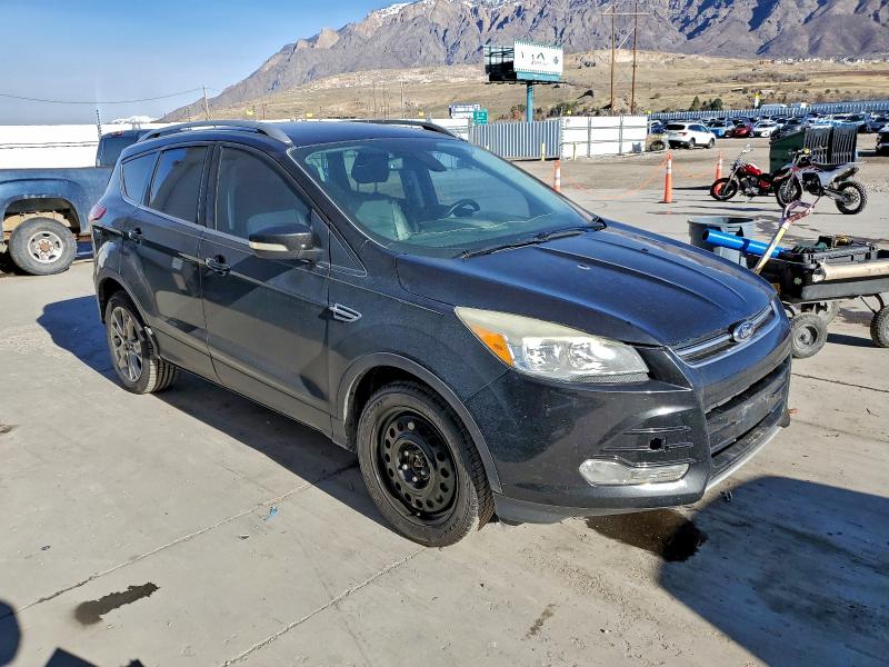 Photo 4 from auction – 2014 FORD ESCAPE TIT with VIN 1FMCU9JX7EUD00471