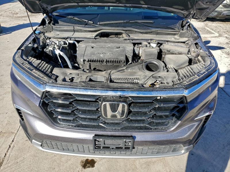Photo 12 from auction – 2025 HONDA PILOT ELIT with VIN 5FNYG1H87SB060070