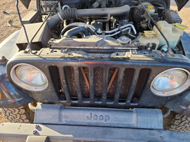 Photo 11 from auction – 2000 JEEP WRANGLER with VIN 1J4FA49S9YP738234