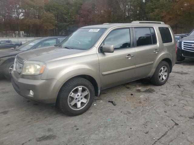 HONDA PILOT EX 2011 with VIN 5FNYF3H4XBB030461 - Photo from auction