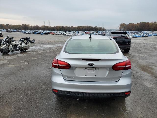 Foto 6 de la subasta – 2018 FORD FOCUS SE con VIN 1FADP3F27JL201505