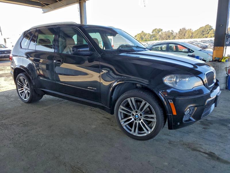 Photo 4 from auction – 2013 BMW X5 XDRIVE3 with VIN 5UXZV4C52D0B14077