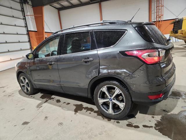Photo 2 from auction – 2017 FORD ESCAPE SE with VIN 1FMCU9GD5HUE80342