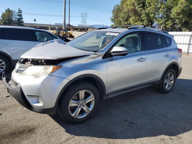 TOYOTA RAV4 XLE 2015 with VIN JTMWFREV8FJ058393 - Photo from auction