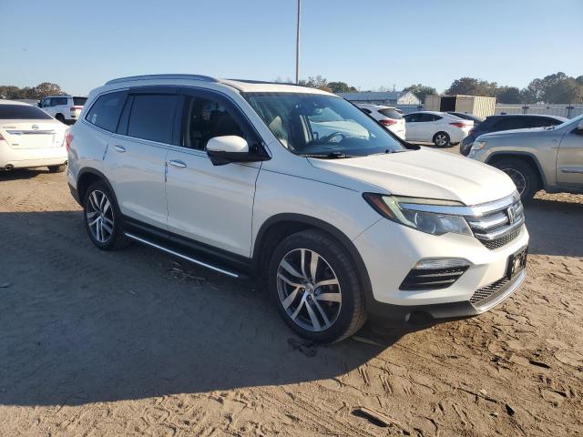 Photo 4 from auction – 2017 HONDA PILOT TOUR with VIN 5FNYF6H91HB017944