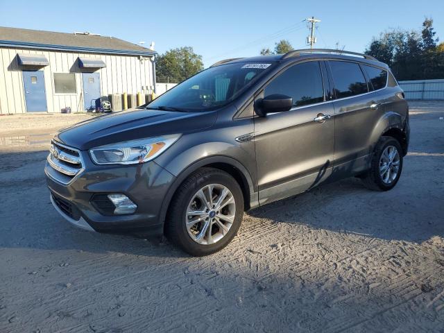 FORD ESCAPE SE 2018 with VIN 1FMCU0G97JUC20909 - Photo from auction