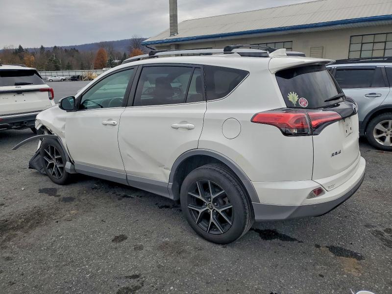 Photo 2 from auction – 2017 TOYOTA RAV4 SE with VIN 2T3JFREV5HW690346