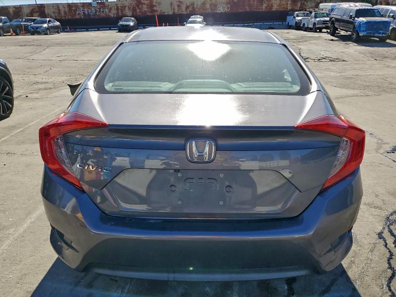 Photo 6 from auction – 2016 HONDA CIVIC LX with VIN 2HGFC2F55GH559275