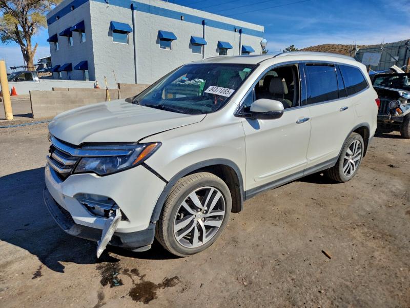 HONDA PILOT 2016 with VIN 5FNYF6H95GB005035 - Photo from auction