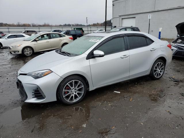 TOYOTA COROLLA L 2017 with VIN 5YFBURHE0HP617515 - Photo from auction